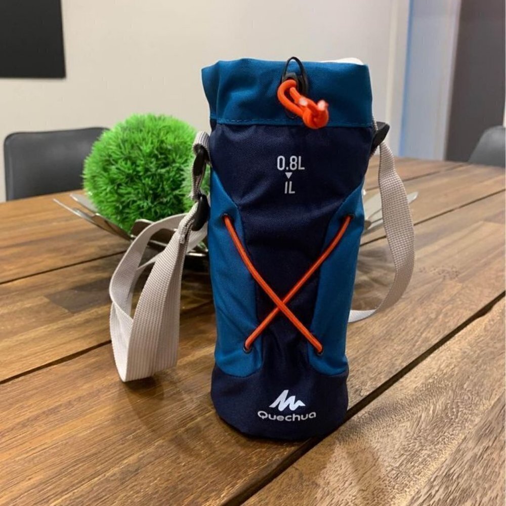 HIKING water carrier. Holds 1 litre. Quechua. Blue with red strap. New!!